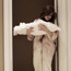 Mother holding baby before Bris